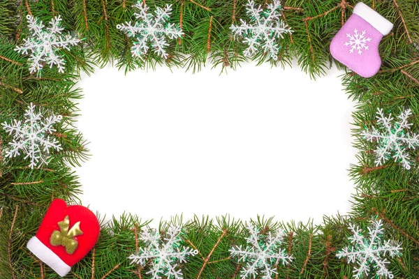 Christmas frame made of fir branches decorated with snowflakes mitten and sock isolated on white background — Stock Photo, Image