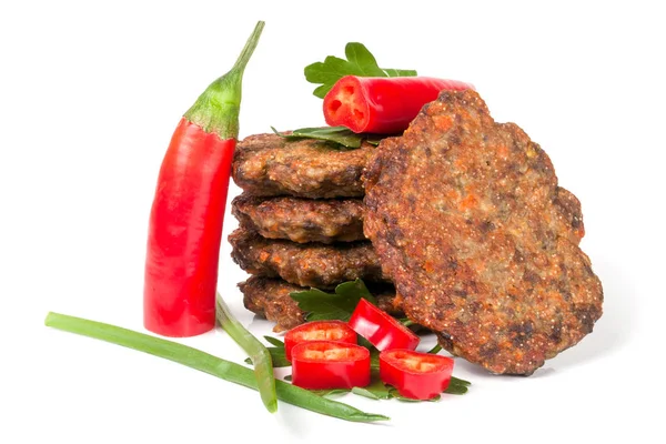 Liver pancakes or cutlets with chili pepper and green onions isolated on white background — Stock Photo, Image