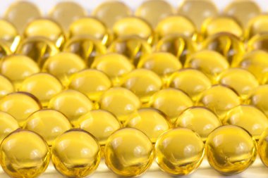 bir sürü balık yağı kapsülleri arka plan olarak