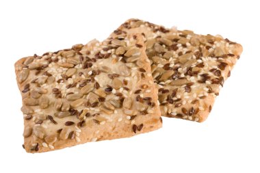 Ayçiçeği, keten ve susam tohumu Isolated beyaz zemin üzerine tohumları ile gevrek ekmek