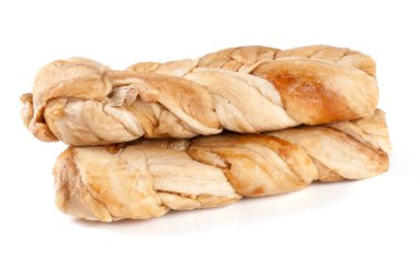 Beyaz arka plan üzerinde izole pigtails şeklinde kurutulmuş kavun