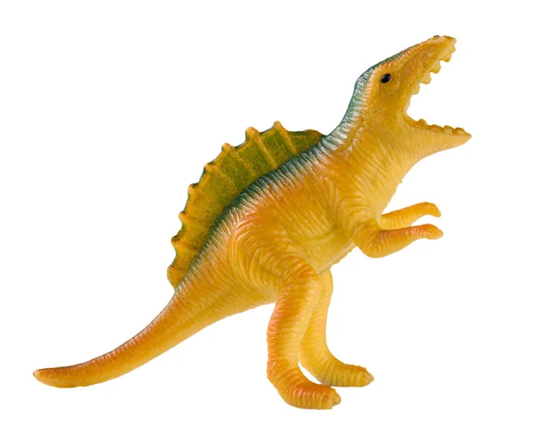 Пластиковая игрушка динозавра на белом фоне — стоковое фото
