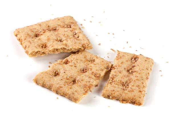 De crispbreads van de gebroken graan geïsoleerd op witte achtergrond — Stockfoto