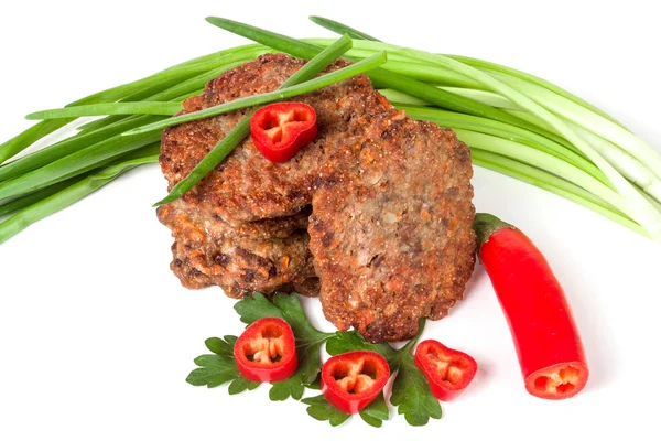 Liver pancakes or cutlets with chili pepper and green onions isolated on white background — Stock Photo, Image