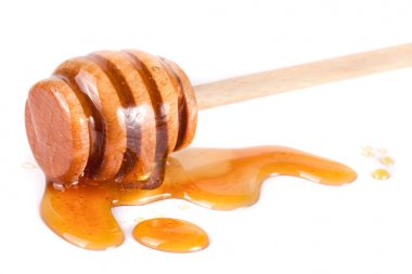 Tatlım sopa ile akan tatlım izole üzerinde beyaz arka plan