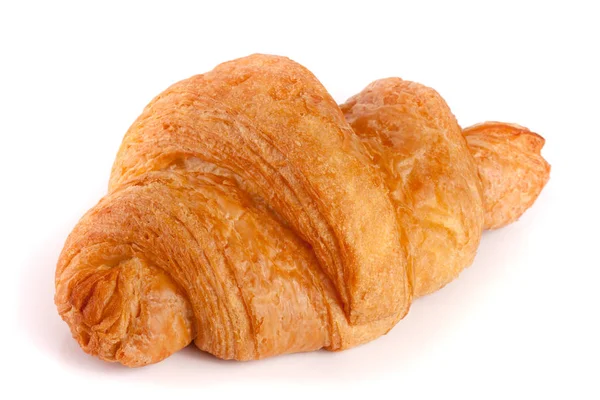 Un croissant isolato su sfondo bianco primo piano — Foto Stock