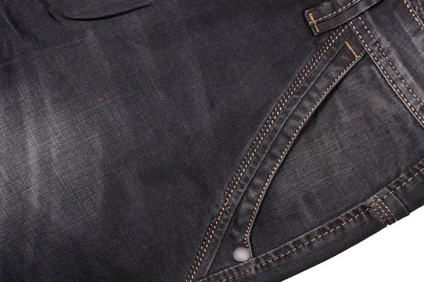 Front pocket of dark jeans close up — Stock Photo, Image