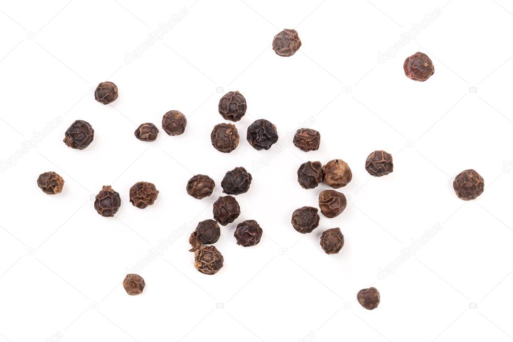Black peppercorn isolated on white background. Top view