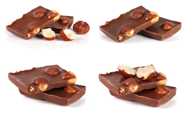 Σοκολάτα με φουντούκια που απομονώνονται σε λευκό φόντο. Σύνολο ή συλλογή — Φωτογραφία Αρχείου