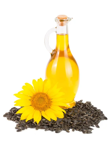 Соняшникова олія, насіння і квітка ізольовані на білому тлі — стокове фото