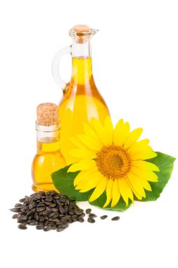 Sunflower oil, seeds and flower isolated on white background clipart