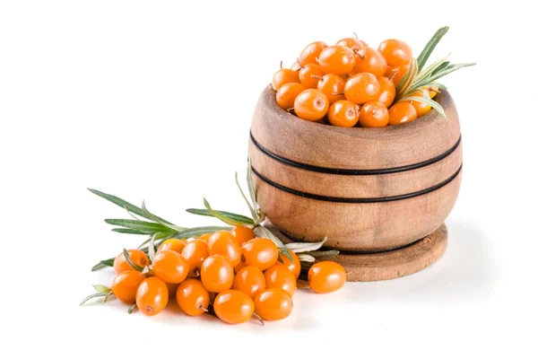 Sea buckthorn. Fresh ripe berry with leaves in a wooden bowl isolated on white background macro — Stock Photo, Image