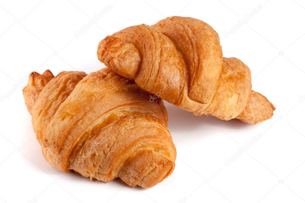 two croissant isolated on white background closeup