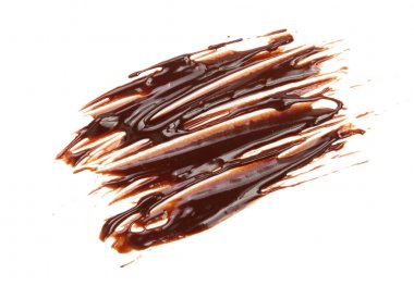 İzole üzerinde beyaz arka plan, yukarıdan dökme sıcak eritilmiş çikolata