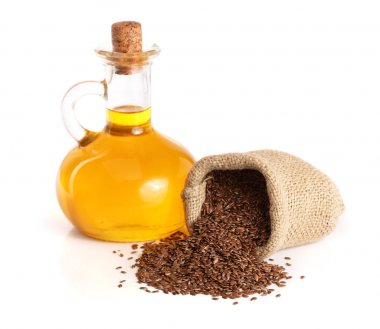 keten tohumu yağı ile beyaz arka plan üzerinde izole keten tohumu