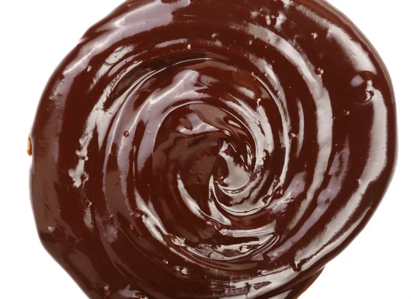 İzole üzerinde beyaz arka plan, yukarıdan dökme sıcak eritilmiş çikolata