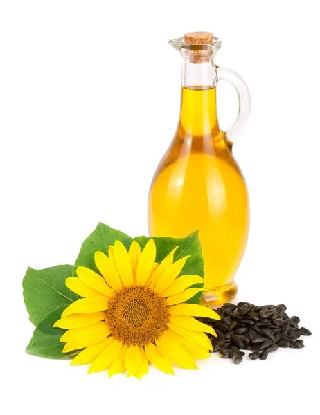 Sunflower oil, seeds and flower isolated on white background — Stock Photo, Image