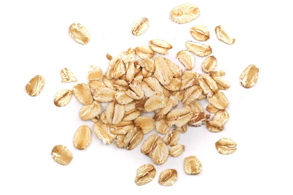 Beyaz arka planda yulaf ezmesi. Üst görünüm