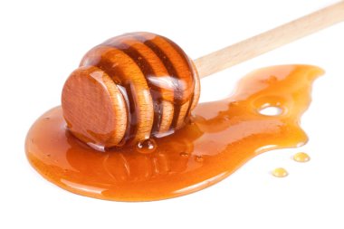 Tatlım sopa ile akan tatlım izole üzerinde beyaz arka plan