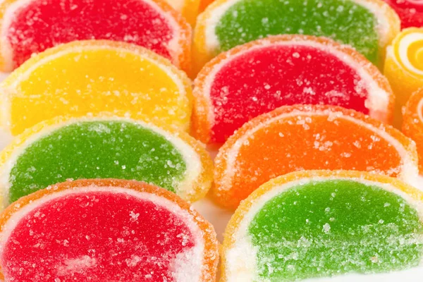 Colorful jellies like slices of lemon and orange on the market close up — Stock Photo, Image