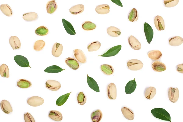 Pistachios with leaves isolated on white background, top view. Flat lay pattern — Stock Photo, Image
