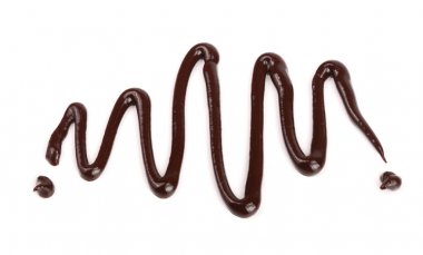 İzole üzerinde beyaz arka plan, yukarıdan dökme sıcak eritilmiş çikolata