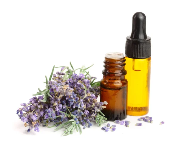 Bottle with aroma oil and lavender flowers isolated on white background — Stock Photo, Image