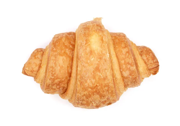 Croissant isolerad på vit bakgrund närbild, ovanifrån — Stockfoto