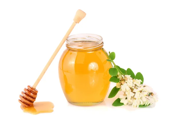 Üveg méz akác virág elszigetelt fehér background — Stock Fotó