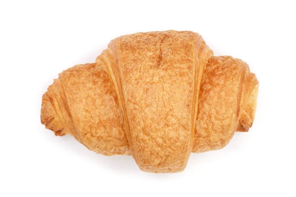 Croissant isolato su sfondo bianco primo piano, vista dall'alto — Foto Stock