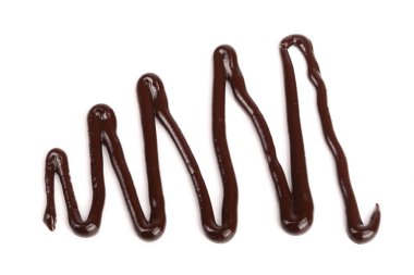 İzole üzerinde beyaz arka plan, yukarıdan dökme sıcak eritilmiş çikolata