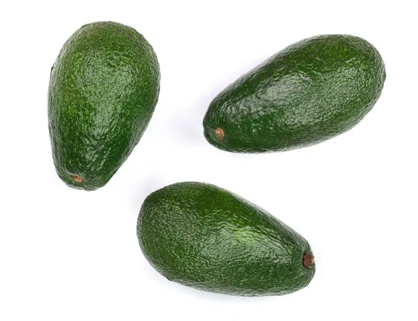 Ganze Avocado isoliert auf weißem Hintergrund Nahaufnahme. Ansicht von oben — Stockfoto