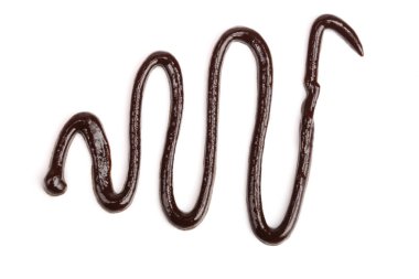 İzole üzerinde beyaz arka plan, yukarıdan dökme sıcak eritilmiş çikolata