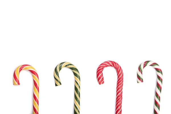 Candy cane randig isolerade på vit bakgrund med kopia utrymme för din text. Ovanifrån — Stockfoto