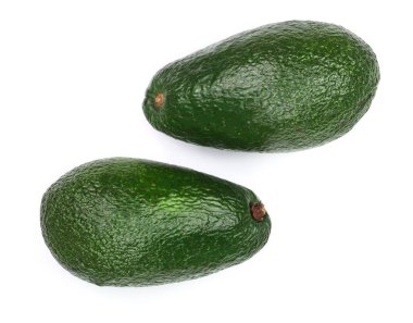 Beyaz arka plan yakın çekim izole bütün avokado. Üstten Görünüm