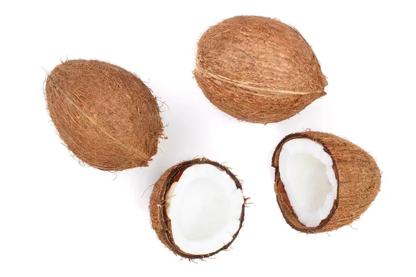 Hela kokos med hälften isolerade på vit bakgrund. Platt låg. Ovanifrån — Stockfoto