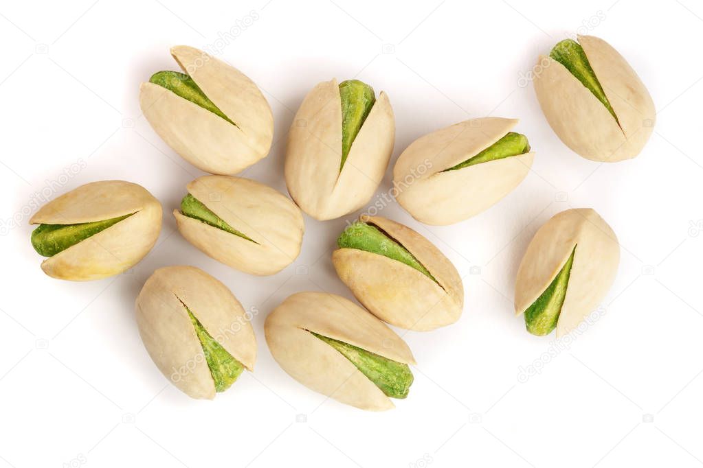 Pistachios isolated on white background, top view. Flat lay