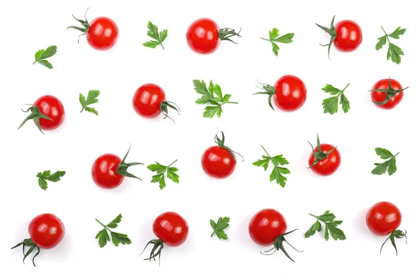Petites tomates cerises aux feuilles de persil isolées sur fond blanc. Set ou collection. Vue de dessus. Pose plate — Photo