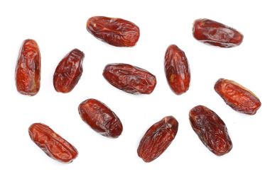 Kuru tarihler beyaz arkaplanda izole edilmiş. Üst Manzara. Düz uzanma deseni