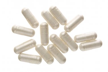 Beyaz arka plan üzerinde izole beyaz hap kapsül. Üstten Görünüm. Düz yatıyordu