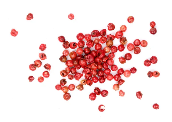 Red peppercorns seeds isolated on white background. Top view. Flat lay — Stock Photo, Image