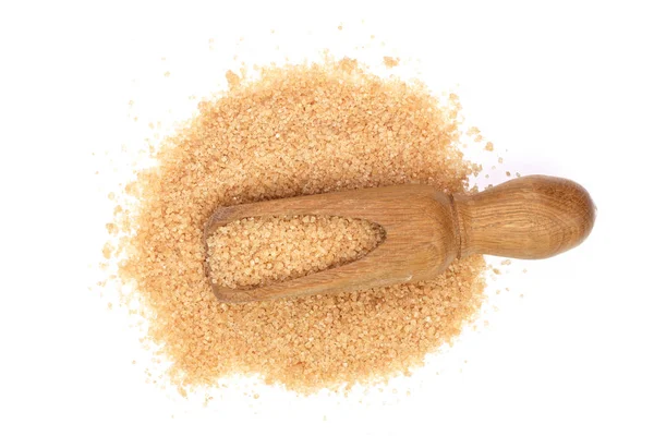 Brown sugar in wooden scoop isolated on white background. Top view. Flat lay — Stock Photo, Image