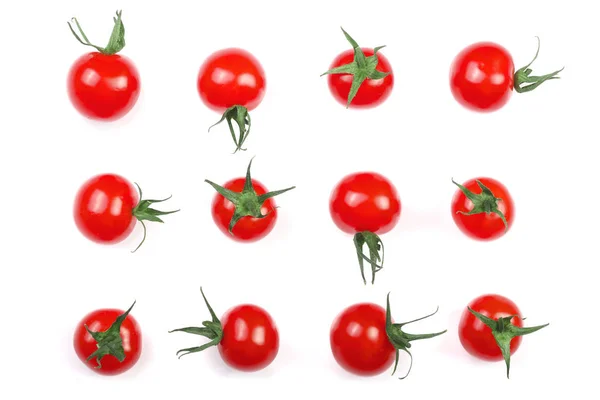 Tomates pequeños de cereza aislados sobre fondo blanco. Conjunto o colección. Vista superior. Puesta plana — Foto de Stock