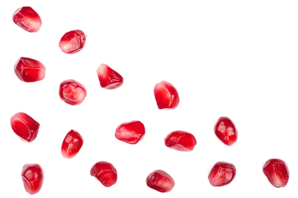 Pomegranate seeds isolated on white background with copy space for your text. Top view. Flat lay pattern — Stock Photo, Image