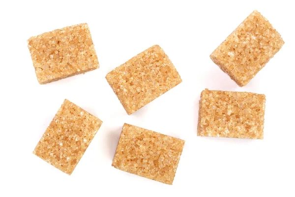 Brown sugar cubes isolated on white background. Top view. Flat lay — Stock Photo, Image