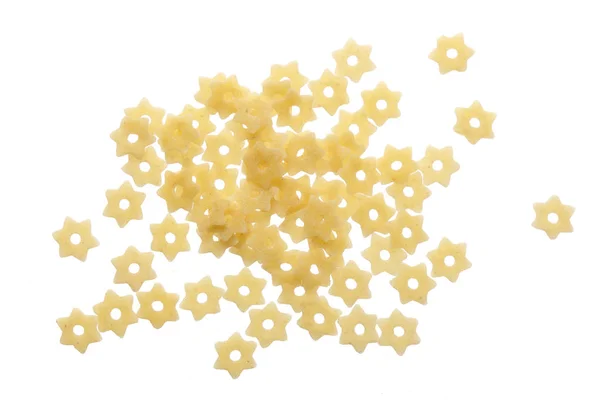 Forma de estrella de pasta aislada sobre fondo blanco. Vista superior. Puesta plana —  Fotos de Stock