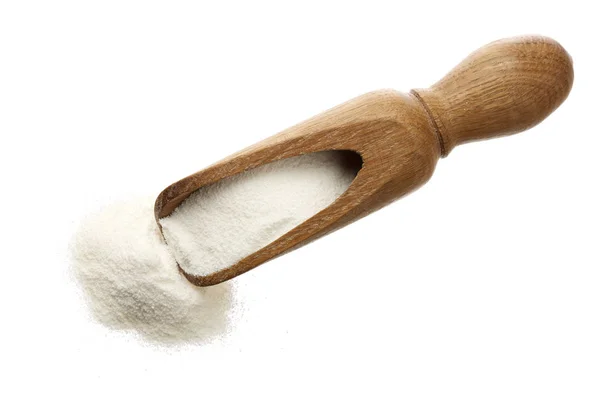 Leche de soja seca en cuchara de madera aislada sobre fondo blanco. Vista superior. Puesta plana — Foto de Stock
