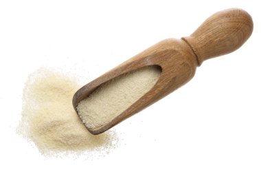 ham irmik ahşap Kepçe beyaz arka plan üzerinde izole içinde. Üstten Görünüm