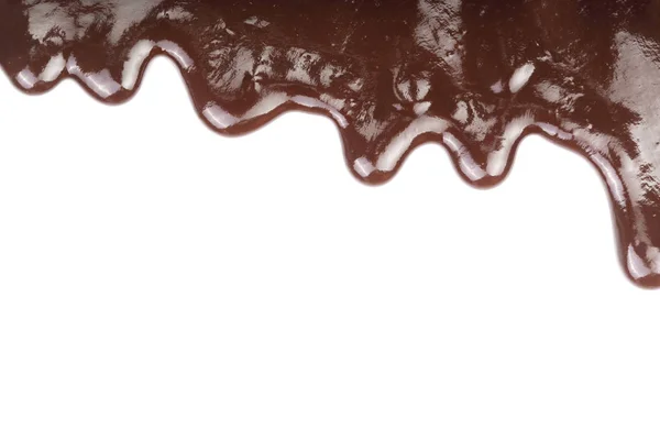 Goteo de chocolate derretido aislado sobre fondo blanco — Foto de Stock