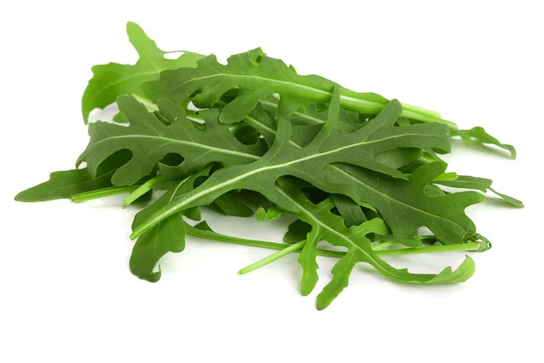 Heap of Green fresh rucola or arugula leaf isolated on white background — Stock Photo, Image